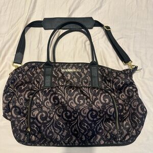 Victoria's Secret Black and Brown Travel Bag with Elegant Design